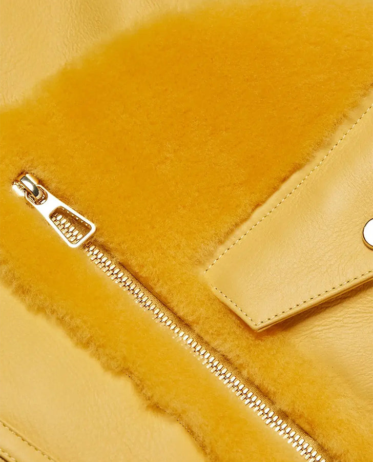 Women's Yellow Shearling Trimmed Leather Moto Jacket - side angle view