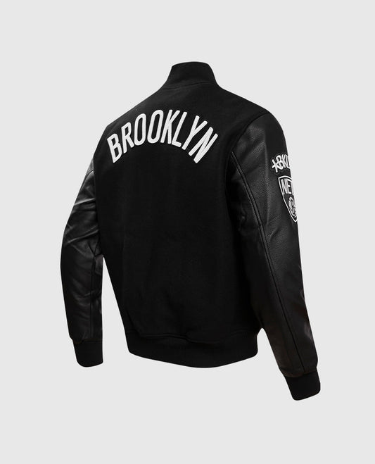 NBA Brooklyn Nets Men's Black Varsity Leather Jacket - side angle view