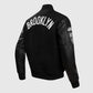 NBA Brooklyn Nets Men's Black Varsity Leather Jacket - side angle view
