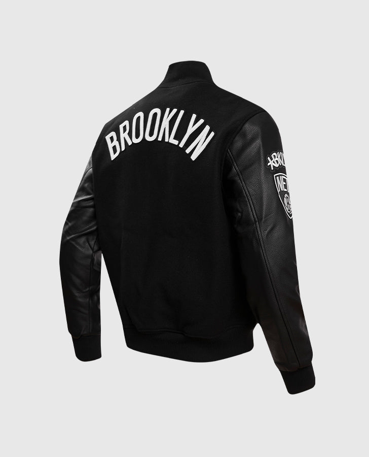 NBA Brooklyn Nets Men's Black Varsity Leather Jacket - side angle view