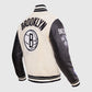 NBA Brooklyn Nets Men's Black & White Varsity Leather Jacket - side angle view