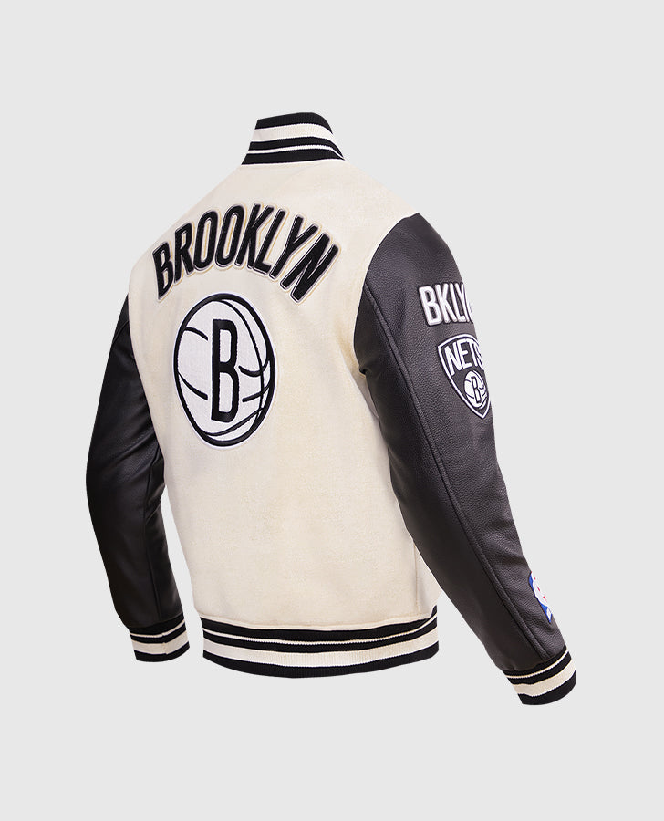 NBA Brooklyn Nets Men's Black & White Varsity Leather Jacket - side angle view